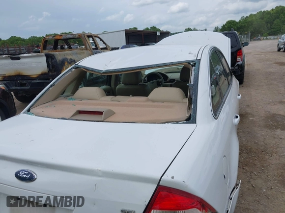 2006 Ford Five Hundred SEL with VIN 1FAFP24166G164248, listed as a IAAI auction lot 42166430 with 122,079 mi miles and . Bid and sale history available at DreamBid. Image 13.