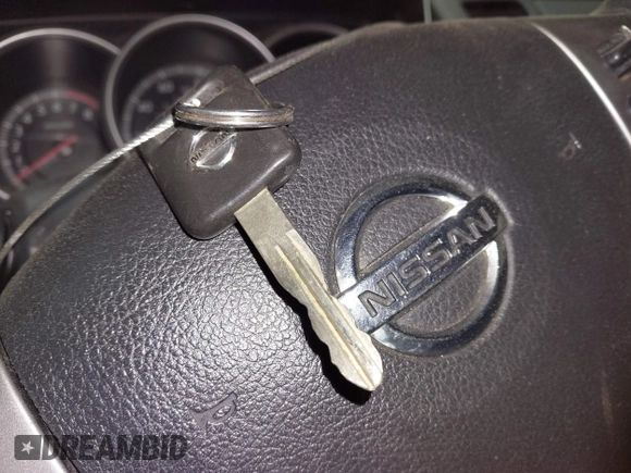 2011 Nissan Versa S with VIN 3N1BC1AP9BL485989, listed as a IAAI auction lot 42414692 with 122,213 mi miles and . Bid and sale history available at DreamBid. Image 11.
