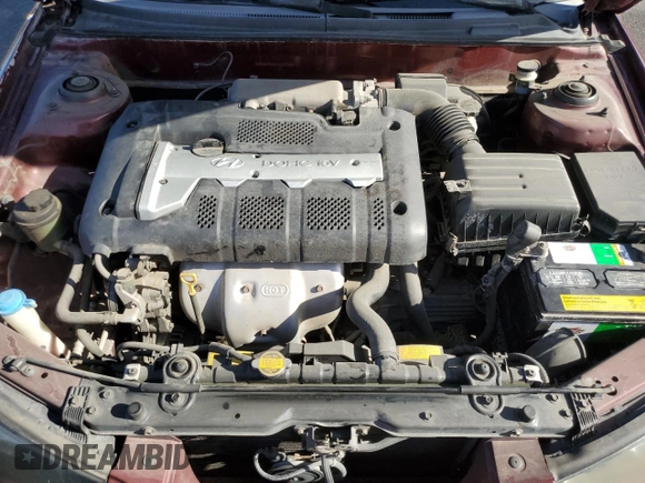 2001 Hyundai Elantra GLS z VIN KMHDN45D41U107399, wystawiony jako Copart lot #52658745 z przebiegiem 65 459 mil mil oraz Szkoda całkowita • Salvage title. Historia ofert i sprzedaży dostępna na DreamBid. Obrazek 11.