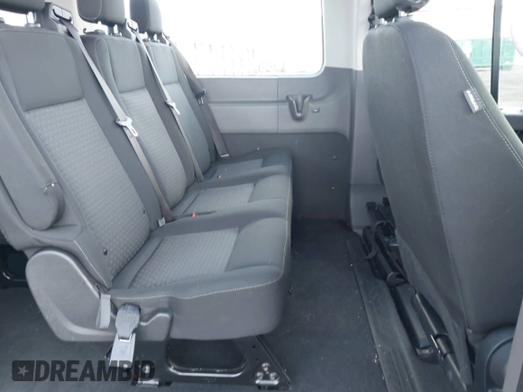 2023 Ford Transit Passenger XL with VIN 1FBAX2C82PKB28840, listed as a IAAI auction lot 41734942 with 20,504 mi miles and . Bid and sale history available at DreamBid. Image 8.