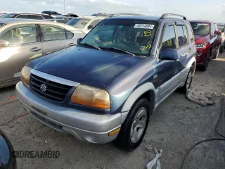 2003 Suzuki Grand Vitara z VIN JS3TE62V534100751, wystawiony jako Copart lot #76714894 z przebiegiem Nie podano mil oraz Nie do naprawy • Non repairable. Historia ofert i sprzedaży dostępna na DreamBid. Obrazek 1.