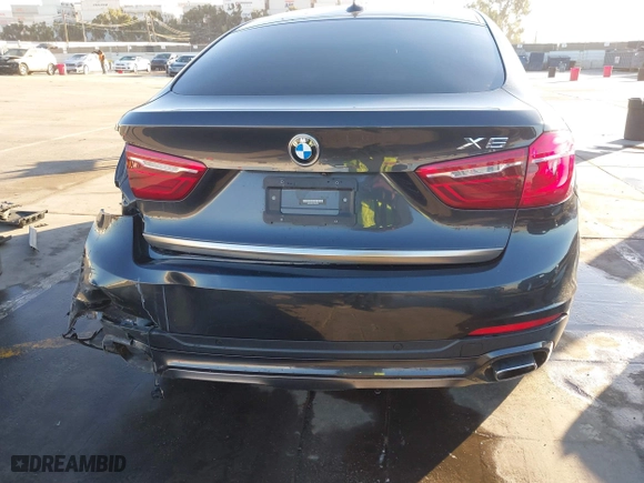 2019 BMW X6 sDrive35i with VIN 5UXKU0C57K0S97581, listed as a IAAI auction lot 41322568 with 76,635 mi miles. Bid and sale history available at carsss.com. Image 16.