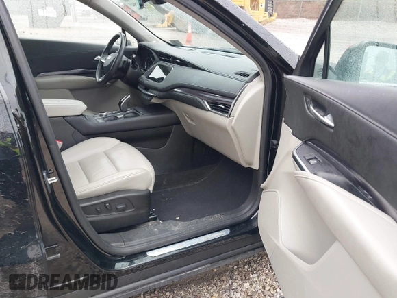 2023 Cadillac XT4 AWD Luxury with VIN 1GYFZBR42PF103973, listed as a IAAI auction lot 41902923 with 70,571 mi miles and . Bid and sale history available at DreamBid. Image 5.