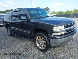 2003 Chevrolet Suburban LT z VIN 3GNEC16Z33G100979, wystawiony jako IAAI lot #42329086 z przebiegiem 268 750 mil mil oraz . Historia ofert i sprzedaży dostępna na DreamBid. Obrazek 1.