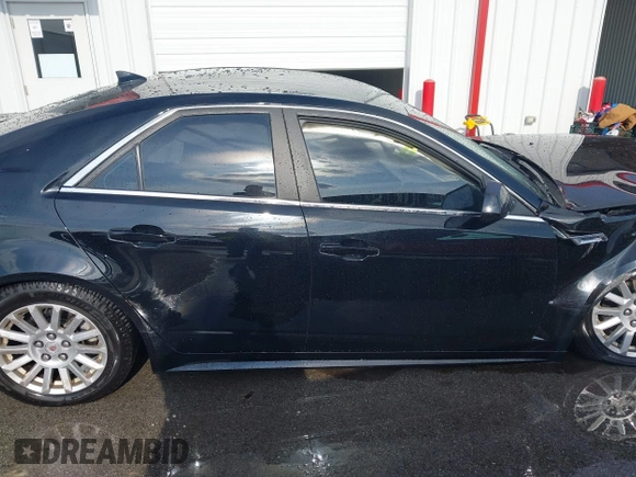 2011 Cadillac CTS with VIN 1G6DC5EY7B0118590, listed as a IAAI auction lot 41003246 with Not provided miles and . Bid and sale history available at DreamBid. Image 14.