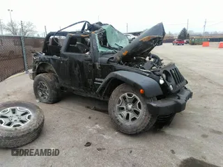 2017 Jeep Wrangler Sport z VIN 1C4AJWAGXHL671766, wystawiony jako IAAI lot #35373501 z przebiegiem Nie podano mil oraz . Historia ofert i sprzedaży dostępna na DreamBid. Obrazek 1.