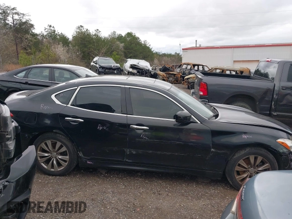 2012 Infiniti M with VIN JN1BY1AP5CM333975, listed as a IAAI auction lot 41701701 with 130,828 mi miles and . Bid and sale history available at DreamBid. Image 13.