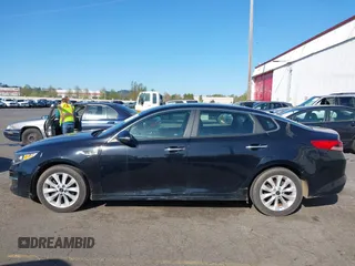 2016 Kia Optima LX with VIN 5XXGT4L31GG003274, listed as a IAAI auction lot 42033788 with 1 mi miles. Bid and sale history available at carsss.com. Image 13.