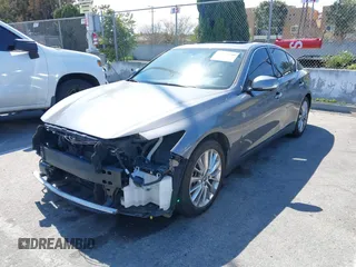 2021 Infiniti Q50 Luxe with VIN JN1EV7BP8MM707259, listed as a IAAI auction lot 41901696 with 78,060 mi miles and . Bid and sale history available at DreamBid. Image 2.