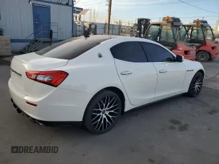 2014 Maserati Ghibli z VIN ZAM57XSA6E1097525, wystawiony jako Copart lot #42029695 z przebiegiem 93 740 mil mil oraz Szkoda całkowita • Salvage title. Historia ofert i sprzedaży dostępna na DreamBid. Obrazek 3.