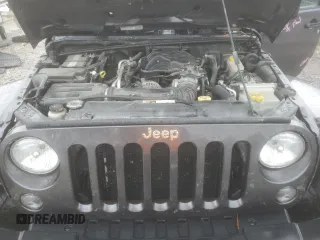 2014 Jeep Wrangler Rubicon with VIN 1C4BJWCG9EL189819, listed as a Copart auction lot 80522204 with 82,083 mi miles and Salvage title. Bid and sale history available at DreamBid. Image 13.