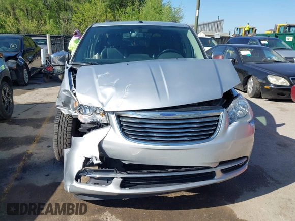 2011 Chrysler Town & Country Touring L z VIN 2A4RR8DG8BR712567, wystawiony jako IAAI lot #42078288 z przebiegiem 144 409 mil mil oraz . Historia ofert i sprzedaży dostępna na DreamBid. Obrazek 12.