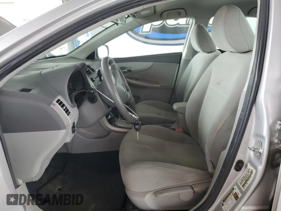 2010 Toyota Corolla with VIN 1NXBU4EE1AZ206765, listed as a Copart auction lot 60996215 with 196,623 mi miles and Salvage title. Bid and sale history available at DreamBid. Image 7.