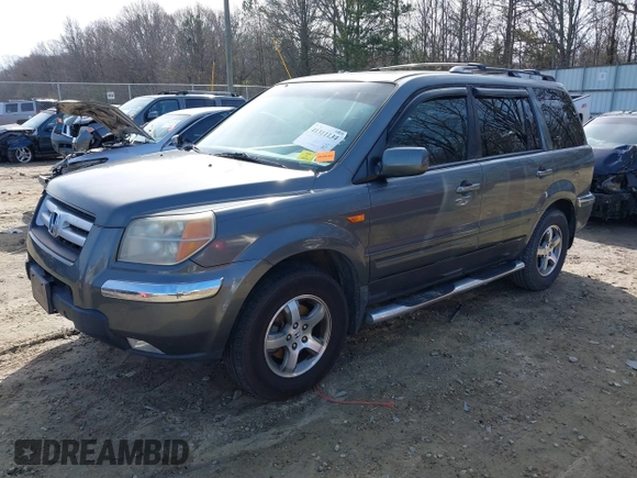 2007 Honda Pilot EX-L with VIN 5FNYF28737B001928, listed as a IAAI auction lot 41311134 with 243,870 mi miles. Bid and sale history available at carsss.com. Image 18.