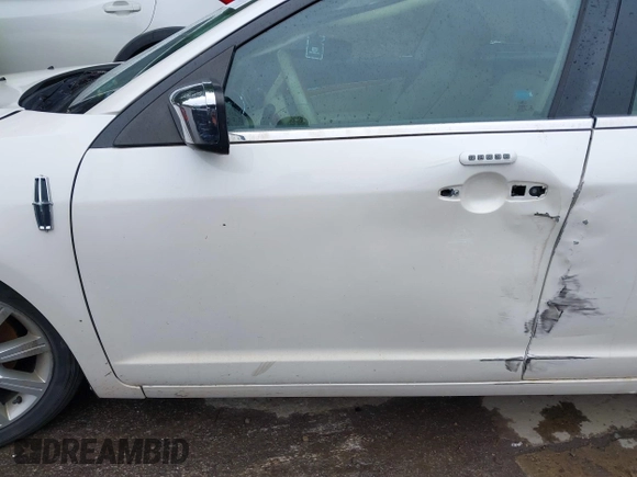 2012 Lincoln MKZ with VIN 3LNHL2JC0CR814339, listed as a IAAI auction lot 42346806 with 127,943 mi miles and . Bid and sale history available at DreamBid. Image 14.