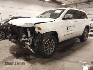 2021 Jeep Grand Cherokee 80th Anniversary with VIN 1C4RJFBG6MC569585, listed as a IAAI auction lot 41341608 with 73,234 mi miles and . Bid and sale history available at DreamBid. Image 22.