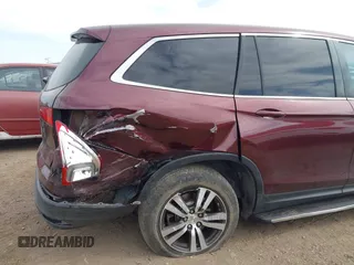 2016 Honda Pilot EX-L with VIN 5FNYF5H57GB028307, listed as a IAAI auction lot 41925711 with 125,118 mi miles and . Bid and sale history available at DreamBid. Image 6.