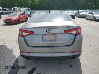 2013 Kia Optima SX z VIN 5XXGR4A63DG167343, wystawiony jako Copart lot #57677305 z przebiegiem 161 446 mil mil oraz Czysty tytuł • Clean title. Historia ofert i sprzedaży dostępna na DreamBid. Obrazek 6.