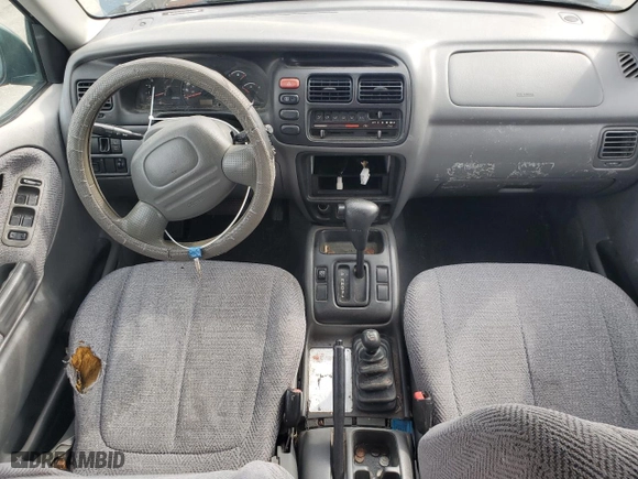 1999 Suzuki Grand Vitara LX with VIN JS3TD62V0X4124366, listed as a Copart auction lot 50885055 with 204,168 mi miles and Salvage Title. Bid and sale history available at carsss.com. Image 8.