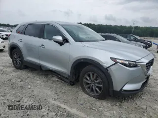 2023 Mazda CX-9 Touring with VIN JM3TCBCY2P0658759, listed as a Copart auction lot 59081855 with 61,480 mi miles and Salvage title. Bid and sale history available at DreamBid. Image 4.