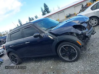 2015 MINI Countryman S z VIN WMWZC3C57FWT06297, wystawiony jako IAAI lot #41988157 z przebiegiem 74 461 mil mil oraz . Historia ofert i sprzedaży dostępna na DreamBid. Obrazek 14.