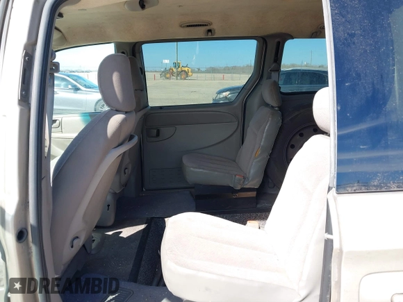 2003 Chrysler Town & Country LX with VIN 2C4GP44L73R103612, listed as a IAAI auction lot 41680848 with 211,360 mi miles and . Bid and sale history available at DreamBid. Image 8.