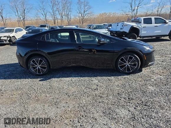 2023 Toyota Prius LE z VIN JTDADABU7P3002593, wystawiony jako Copart lot #48176675 z przebiegiem 10 726 mil mil oraz Szkoda całkowita • Salvage title. Historia ofert i sprzedaży dostępna na DreamBid. Obrazek 14.