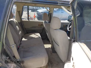 1998 Mitsubishi Montero LS z VIN JA4MT31P9WP005522, wystawiony jako IAAI lot #42047242 z przebiegiem Nie podano mil oraz . Historia ofert i sprzedaży dostępna na DreamBid. Obrazek 8.