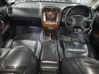 1997 Nissan Maxima with VIN HBY33200347, listed as a Copart auction lot 47182085 with 173,662 mi miles and Salvage title. Bid and sale history available at DreamBid. Image 8.