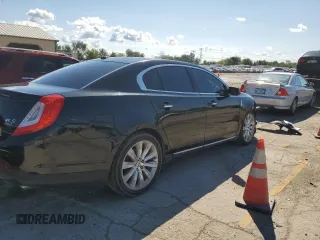 2013 Lincoln MKS EcoBoost with VIN 1LNHL9FT9DG612206, listed as a Copart auction lot 73112854 with Not Provided miles and Salvage Title. Bid and sale history available at DreamBid. Image 3.