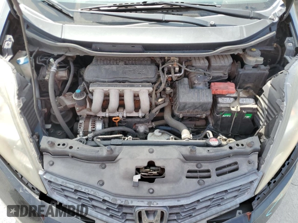 2012 Honda Fit Sport with VIN JHMGE8H5XCC006016, listed as a Copart auction lot 52941995 with 196,312 mi miles and Salvage Title. Bid and sale history available at carsss.com. Image 11.