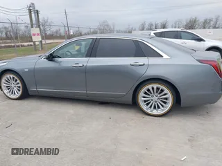 2018 Cadillac CT6 Luxury RWD z VIN 1G6KC5RX4JU159789, wystawiony jako IAAI lot #41145010 z przebiegiem 73 811 mil mil oraz . Historia ofert i sprzedaży dostępna na DreamBid. Obrazek 14.