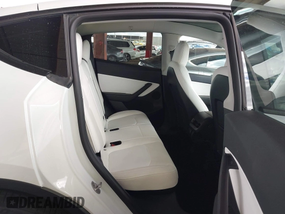 2022 Tesla Model Y Performance with VIN 7SAYGDEF4NF449986, listed as a IAAI auction lot 41754916 with 64,384 mi miles and . Bid and sale history available at DreamBid. Image 8.