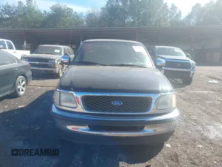 1997 Ford F-150 with VIN 1FTDX1727VKD59948, listed as a IAAI auction lot 41659013 with 257,047 mi miles and . Bid and sale history available at DreamBid. Image 6.