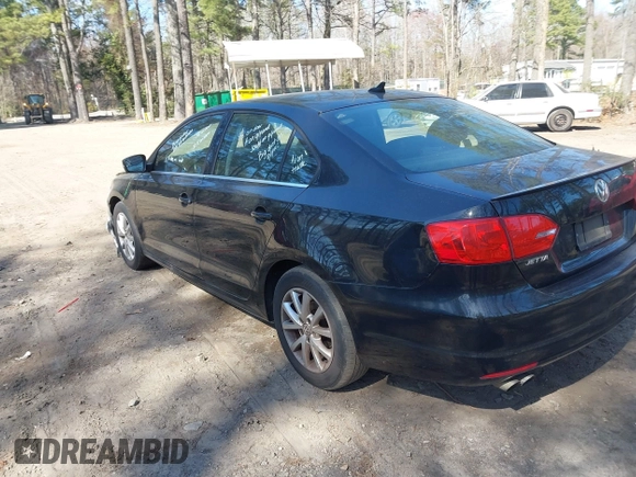 2013 Volkswagen Jetta SE with VIN 3VWDX7AJ5DM375119, listed as a IAAI auction lot 41779752 with 149,943 mi miles and . Bid and sale history available at DreamBid. Image 3.