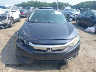 2016 Honda Civic EX-L with VIN 19XFC1F79GE003492, listed as a IAAI auction lot 42563306 with 166,420 mi miles and . Bid and sale history available at DreamBid. Image 12.