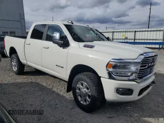 2023 Ram 2500 Laramie with VIN 3C6UR5FJ1PG591070, listed as a Copart auction lot 47958825 with 15,623 mi miles and Salvage title. Bid and sale history available at DreamBid. Image 4.