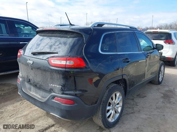 2014 Jeep Cherokee Limited with VIN 1C4PJMDS8EW129252, listed as a IAAI auction lot 41881697 with 111,178 mi miles. Bid and sale history available at carsss.com. Image 4.