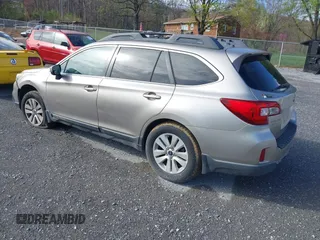 2015 Subaru Outback Premium with VIN 4S4BSAECXF3221961, listed as a IAAI auction lot 41910571 with 222,670 mi miles and . Bid and sale history available at DreamBid. Image 3.