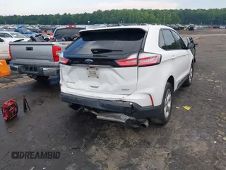 2020 Ford Edge SE z VIN 2FMPK3G91LBB28034, wystawiony jako IAAI lot #42256654 z przebiegiem 95 997 mil mil oraz . Historia ofert i sprzedaży dostępna na DreamBid. Obrazek 4.