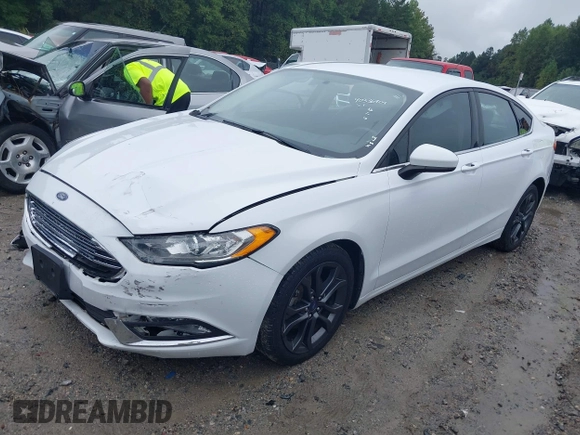 2018 Ford Fusion SE with VIN 3FA6P0HD6JR153230, listed as a IAAI auction lot 40336904 with 71,949 mi miles and . Bid and sale history available at DreamBid. Image 2.
