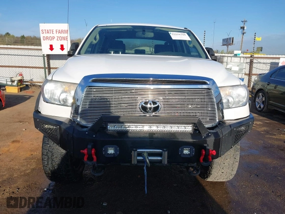 2012 Toyota Tundra 4WD Truck with VIN 5TFDW5F10CX241968, listed as a IAAI auction lot 41858300 with 272,634 mi miles. Bid and sale history available at carsss.com. Image 12.