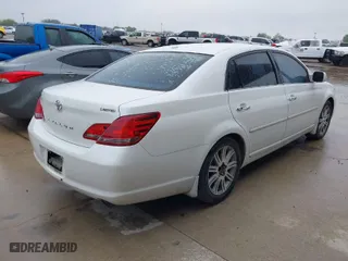 2010 Toyota Avalon XL with VIN 4T1BK3DB3AU356836, listed as a IAAI auction lot 41832249 with 208,547 mi miles. Bid and sale history available at carsss.com. Image 4.