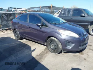 2012 Ford Fiesta S with VIN 3FADP4AJ4CM187553, listed as a IAAI auction lot 41965362 with 136,021 mi miles. Bid and sale history available at carsss.com. Image 1.