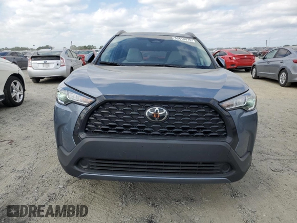 2023 Toyota Corolla Cross LE z VIN 7MUBAAAG6PV039602, wystawiony jako Copart lot #53419475 z przebiegiem 34 033 mil mil oraz Szkoda całkowita • Salvage title. Historia ofert i sprzedaży dostępna na DreamBid. Obrazek 5.