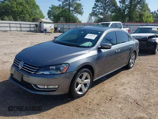 2015 Volkswagen Passat 1.8T Wolfsburg Ed with VIN 1VWAT7A3XFC115934, listed as a IAAI auction lot 41948035 with 243,143 mi miles. Bid and sale history available at carsss.com. Image 2.