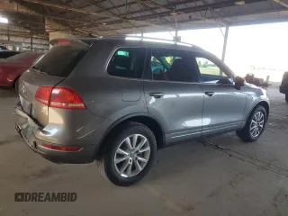 2013 Volkswagen Touareg Lux с VIN WVGEF9BP9DD003735, выставлен на аукционе Copart как лот 58852315 с пробегом 138 223 миль миль и Списание • Salvage title. История ставок и продаж доступна на DreamBid. Изображение 3.