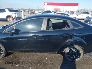 2019 Ford Fiesta SE with VIN 3FADP4BJ3KM117443, listed as a IAAI auction lot 41872511 with 73,981 mi miles. Bid and sale history available at carsss.com. Image 6.