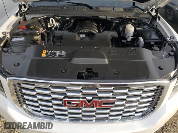 2019 GMC Yukon Denali with VIN 1GKS1CKJXKR220567, listed as a Copart auction lot 77388704 with 38,955 mi miles and Non Repairable. Bid and sale history available at carsss.com. Image 12.