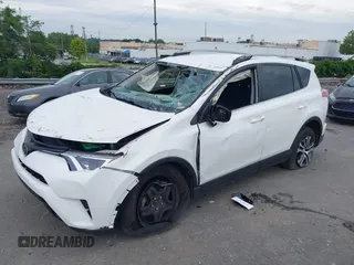 2018 Toyota RAV4 LE with VIN JTMBFREV6JJ210226, listed as a IAAI auction lot 42700312 with Not provided miles and . Bid and sale history available at DreamBid. Image 18.